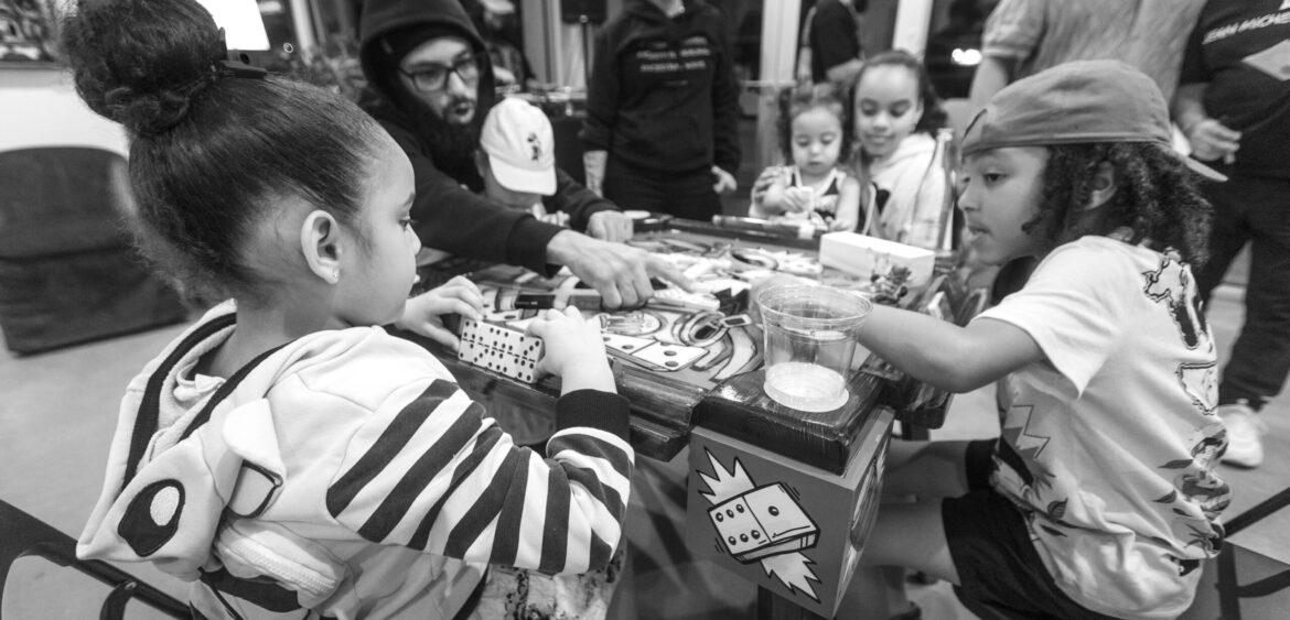 Photographs from the opening night of Carlos Solano’s solo exhibition “An Experience of Us” at WYN317 Gallery in Miami, moving from artwork on the walls and guests in conversation to a salsa jam at Toejam Backlot, ending with Solano painting live.