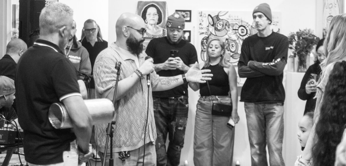 Photographs from the opening night of Carlos Solano’s solo exhibition “An Experience of Us” at WYN317 Gallery in Miami, moving from artwork on the walls and guests in conversation to a salsa jam at Toejam Backlot, ending with Solano painting live.