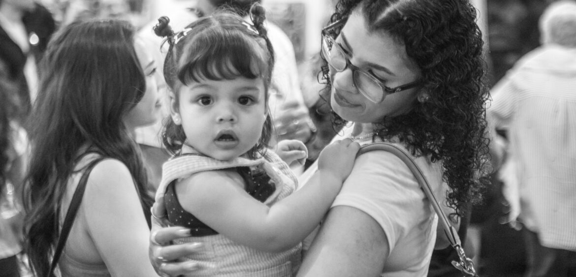 Photographs from the opening night of Carlos Solano’s solo exhibition “An Experience of Us” at WYN317 Gallery in Miami, moving from artwork on the walls and guests in conversation to a salsa jam at Toejam Backlot, ending with Solano painting live.