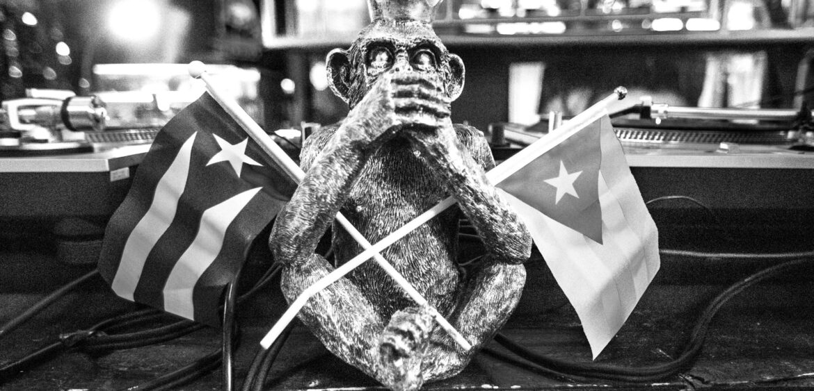 Photographs from the opening night of Carlos Solano’s solo exhibition “An Experience of Us” at WYN317 Gallery in Miami, moving from artwork on the walls and guests in conversation to a salsa jam at Toejam Backlot, ending with Solano painting live.