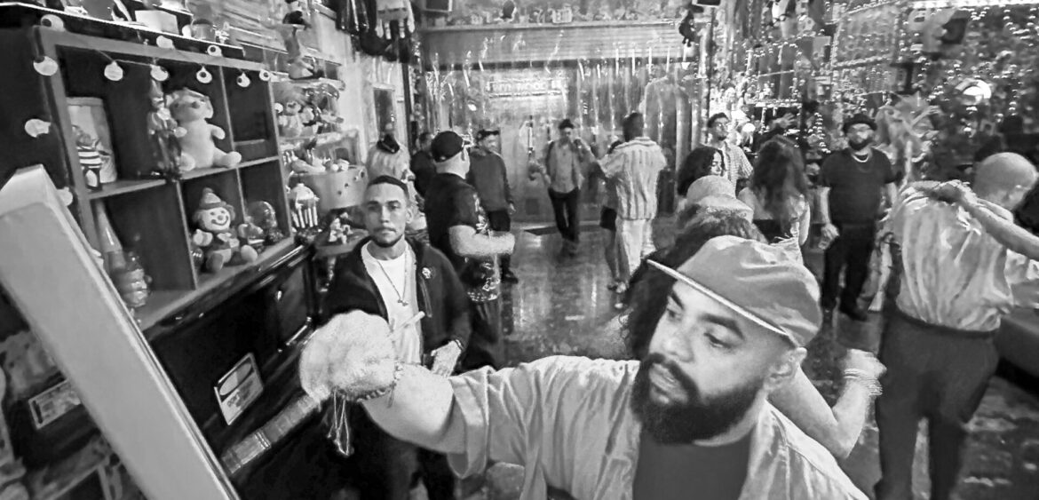 Photographs from the opening night of Carlos Solano’s solo exhibition “An Experience of Us” at WYN317 Gallery in Miami, moving from artwork on the walls and guests in conversation to a salsa jam at Toejam Backlot, ending with Solano painting live.