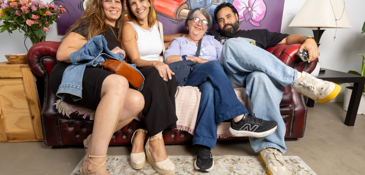 Documentary photograph from Sunset Rumba at WYN317 in Miami, showing live music and gallery activity during the closing reception for Carlos Solano’s exhibition “An Experience of Us.”